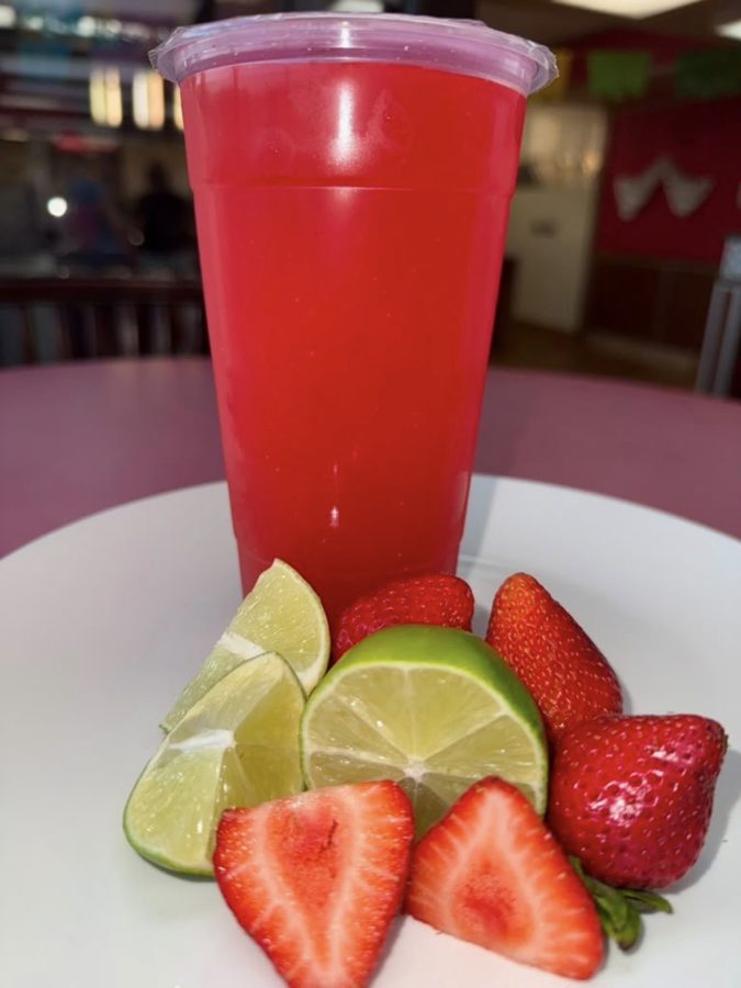 Fresh strawberry lemonade with strawberries and lime